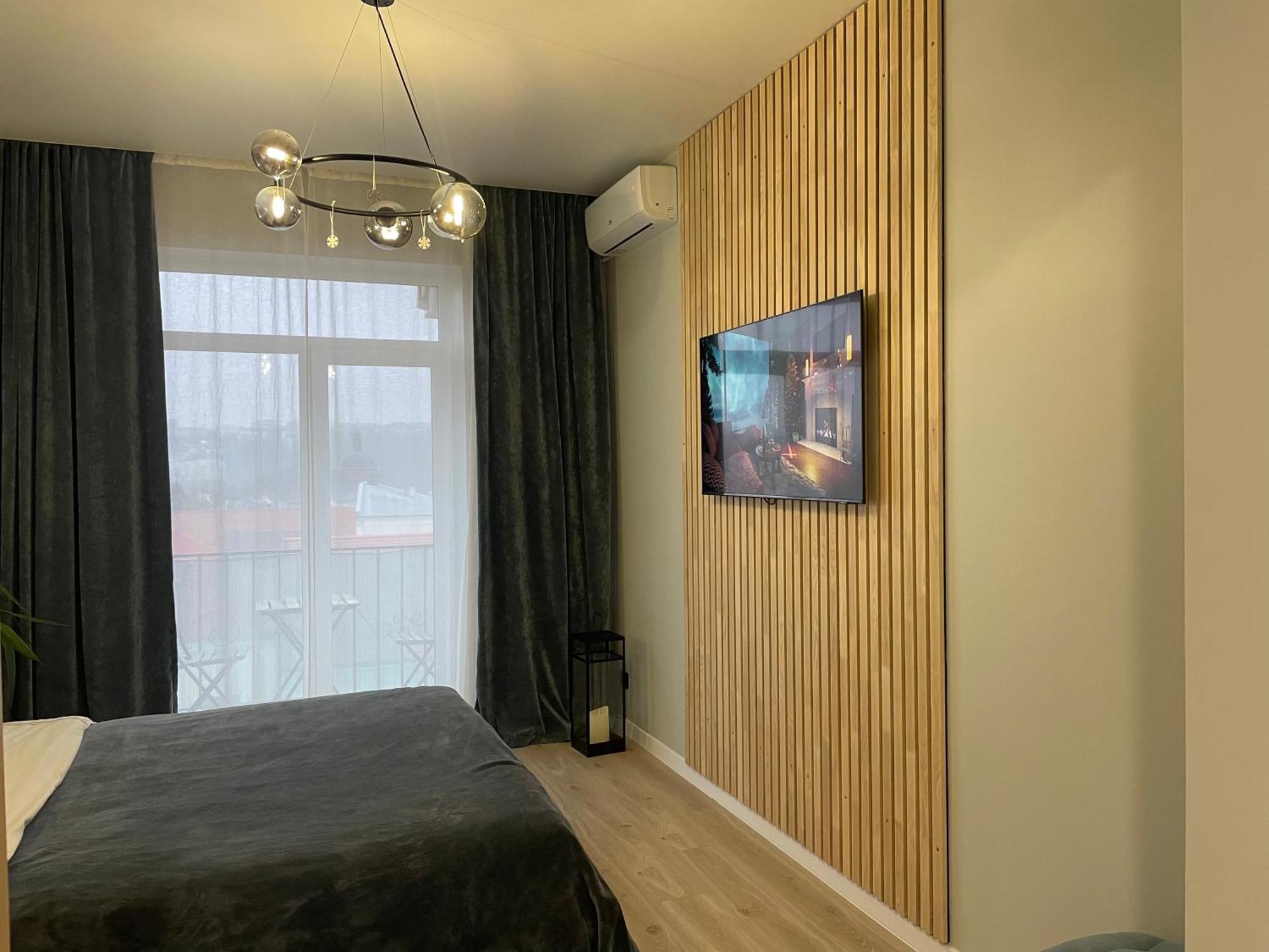 Ferienwohnung «Гори́Ще На Площі Польський Ринок» Kamjanez-Podilskyj Exterior foto